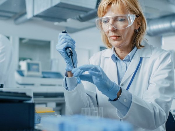 Researcher uses a micropipette