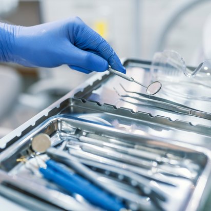 Dental tools and other accessories Dental tools and other accessories commonly used by dentists are arranged in a dental office setting