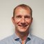 A close-up photo, headshot, of our colleague Martin Suhr