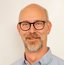 A close-up photo, headshot, of our colleague Martin Olsson