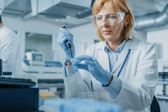 A researcher uses a micropipette